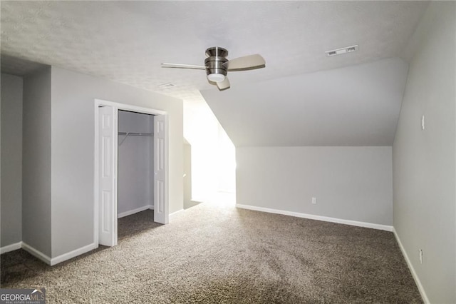 4820 Camden Dr SW, Conyers, GA 30094 - additional living space featuring carpet floors, ceiling fan, lofted ceiling, and baseboards