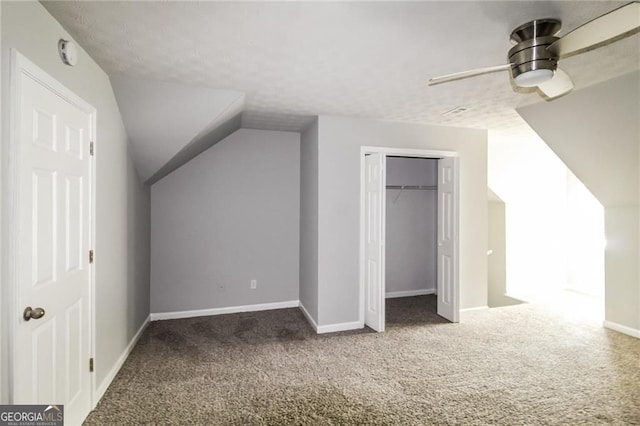 4820 Camden Dr SW, Conyers, GA 30094 - bonus room featuring carpet flooring, a ceiling fan, vaulted ceiling, and baseboards