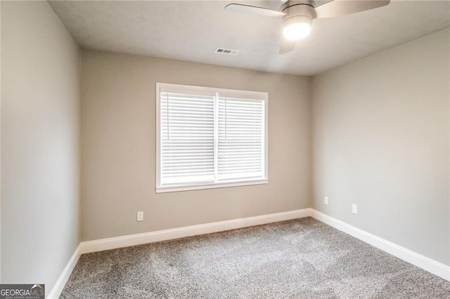 4820 Camden Dr SW, Conyers, GA 30094 - unfurnished room featuring ceiling fan, carpet, and baseboards