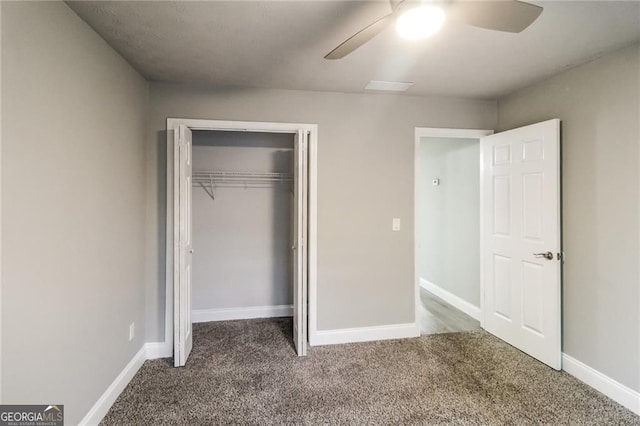 4820 Camden Dr SW, Conyers, GA 30094 - unfurnished bedroom with carpet floors, a closet, and baseboards