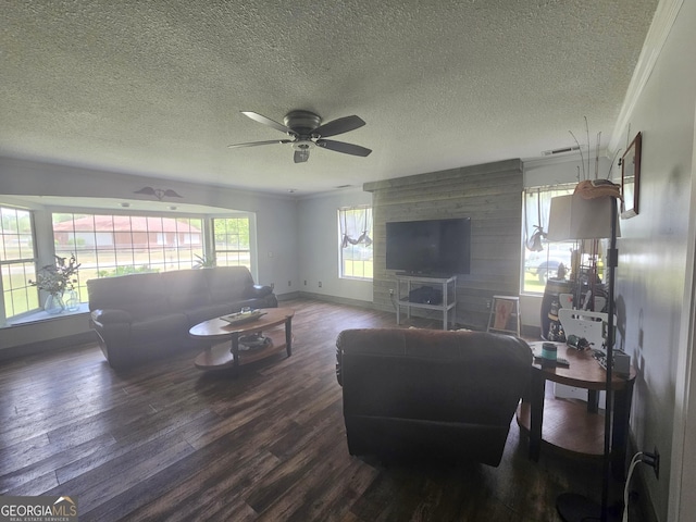 459 Stilson Rd, Brooklet, GA 30415 - living room featuring wood finished floors, a textured ceiling, ceiling fan, and baseboards
