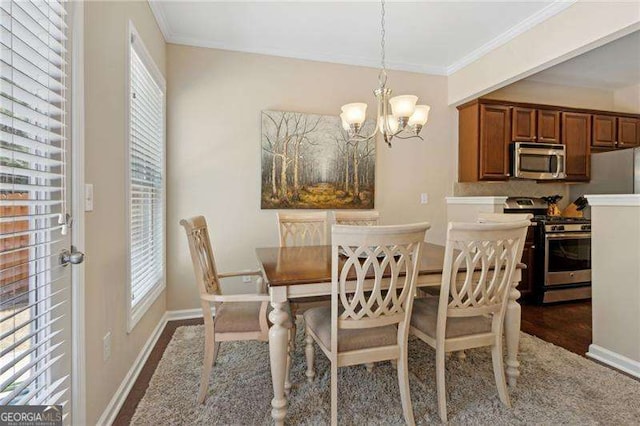 6160 Shiloh Woods Dr, Cumming, GA 30040 - dining room featuring plenty of natural light, a chandelier, crown molding, baseboards, and dark wood-style flooring