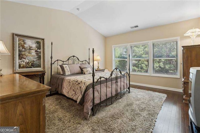 6160 Shiloh Woods Dr, Cumming, GA 30040 - bedroom featuring lofted ceiling, dark wood-type flooring, and baseboards