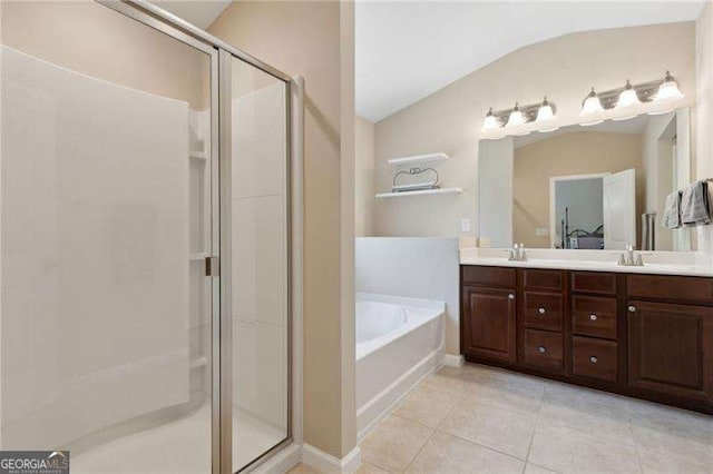 6160 Shiloh Woods Dr, Cumming, GA 30040 - full bathroom with lofted ceiling, a shower stall, a bath, tile patterned floors, and double vanity