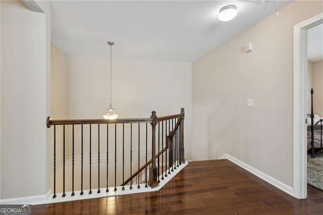 6160 Shiloh Woods Dr, Cumming, GA 30040 - stairway with wood finished floors and baseboards