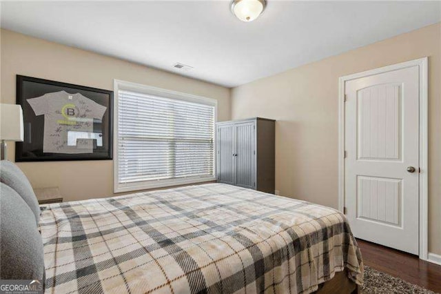 6160 Shiloh Woods Dr, Cumming, GA 30040 - bedroom featuring dark wood-style flooring