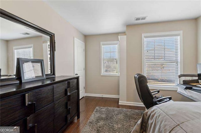 6160 Shiloh Woods Dr, Cumming, GA 30040 - bedroom with dark wood finished floors, baseboards, multiple windows, and a desk