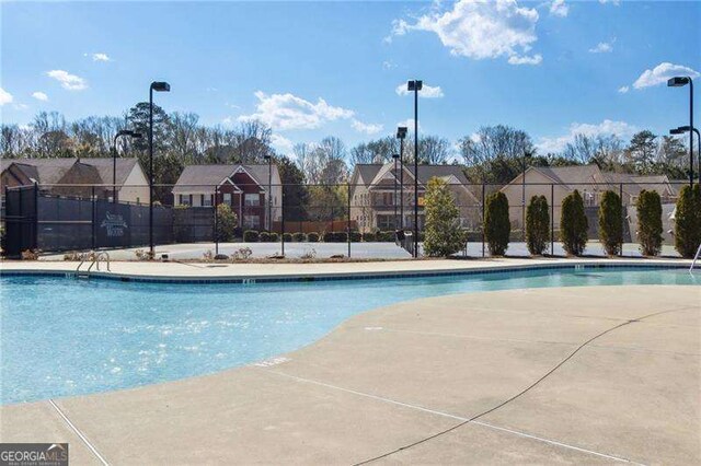 6160 Shiloh Woods Dr, Cumming, GA 30040 - community pool with a residential view
