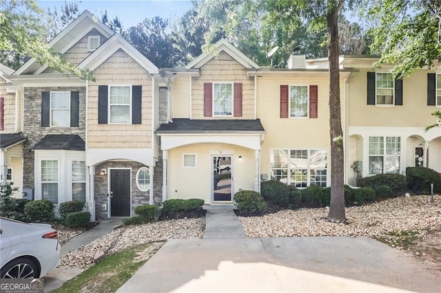 6073 Camden Forrest Dr, Riverdale, GA 30296 - townhome / multi-family property with a chimney and stone siding