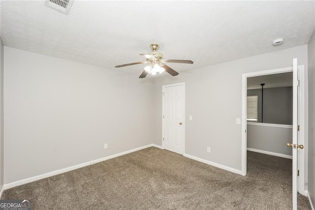 6073 Camden Forrest Dr, Riverdale, GA 30296 - carpeted empty room with ceiling fan, a smoke detector, and a textured ceiling