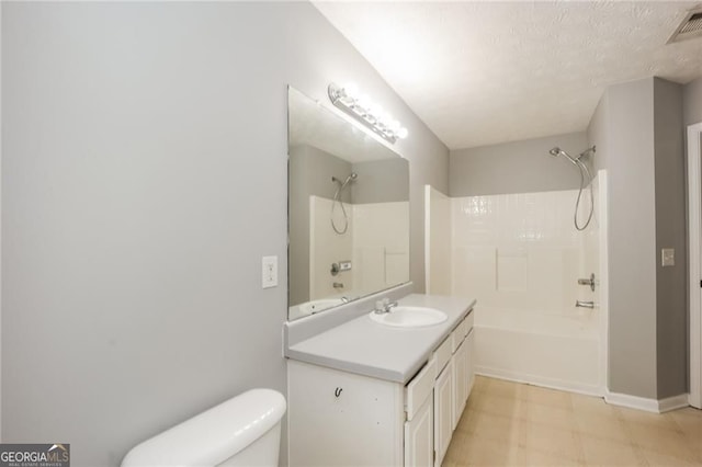 6073 Camden Forrest Dr, Riverdale, GA 30296 - bathroom featuring shower / washtub combination, vanity, tile patterned floors, and a textured ceiling