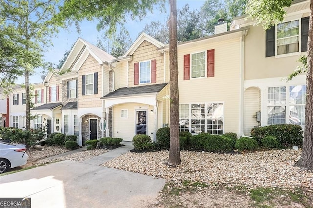 6073 Camden Forrest Dr, Riverdale, GA 30296 - view of property featuring a chimney