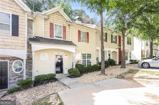 6073 Camden Forrest Dr, Riverdale, GA 30296 - view of property with stone siding and a residential view