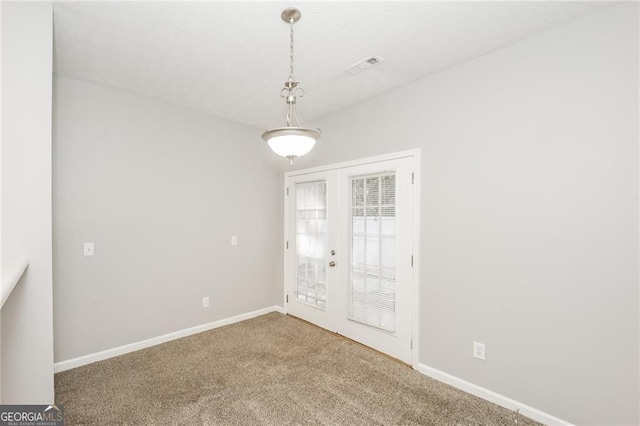 6073 Camden Forrest Dr, Riverdale, GA 30296 - unfurnished room with french doors, carpet flooring, and baseboards