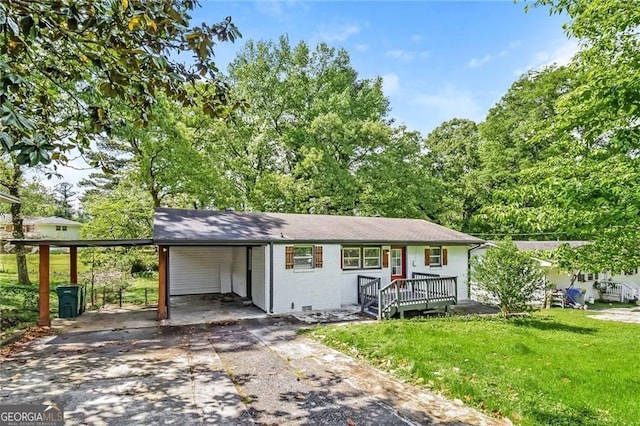 4309 Gilbert Pl, Forest Park, GA 30297 - ranch-style house with concrete driveway, a carport, a front lawn, brick siding, and crawl space
