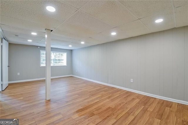 4309 Gilbert Pl, Forest Park, GA 30297 - basement with light wood-style flooring, baseboards, a drop ceiling, and recessed lighting