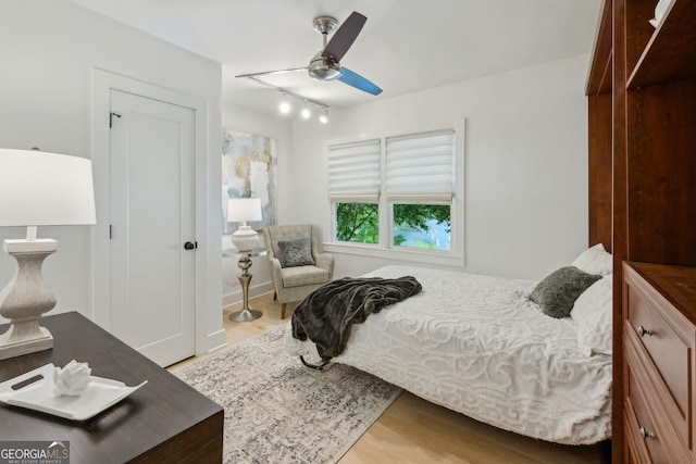 1168 Mclynn Ave NE, Atlanta, GA 30306 - bedroom featuring wood finished floors, rail lighting, and ceiling fan