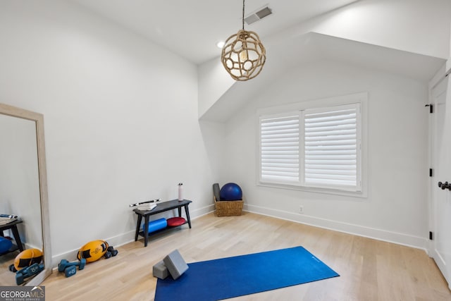 1168 Mclynn Ave NE, Atlanta, GA 30306 - exercise room with wood finished floors, vaulted ceiling, and baseboards