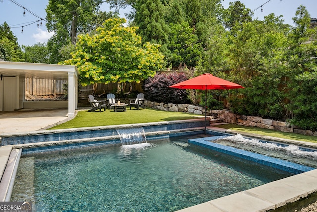 1168 Mclynn Ave NE, Atlanta, GA 30306 - swimming pool featuring an outdoor fire pit, an outdoor hot tub, a patio, and view of scattered trees