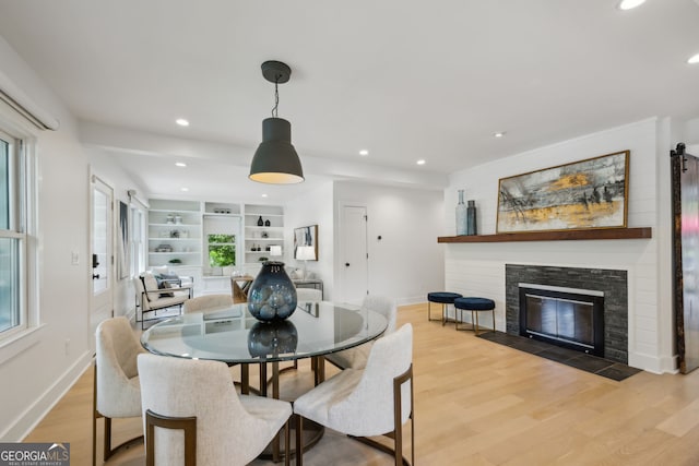 1168 Mclynn Ave NE, Atlanta, GA 30306 - dining room with baseboards, wood finished floors, recessed lighting, and healthy amount of natural light
