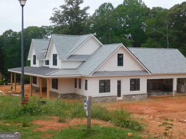 1278 Mulberry, Commerce, GA 30530 - view of front of home featuring a shingled roof, a standing seam roof, and metal roof