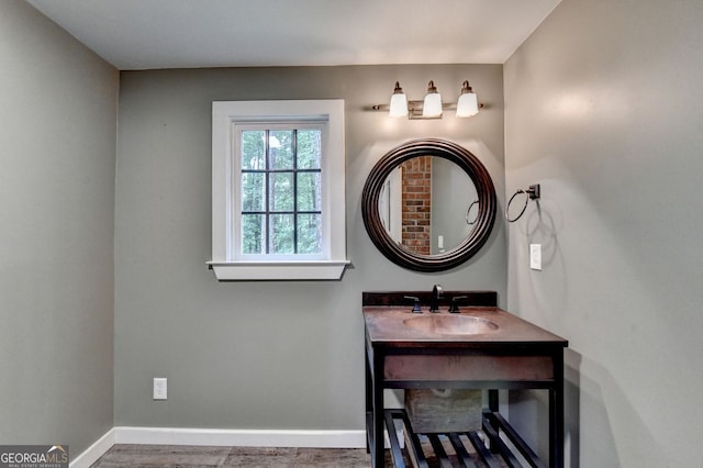 5507 Martina Way, Dunwoody, GA 30338 - bathroom featuring wood finished floors and vanity