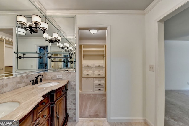 5507 Martina Way, Dunwoody, GA 30338 - bathroom with double vanity, a spacious closet, a chandelier, and crown molding