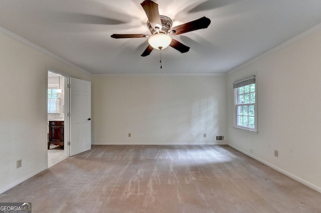 5507 Martina Way, Dunwoody, GA 30338 - empty room featuring ornamental molding, a ceiling fan, and light carpet