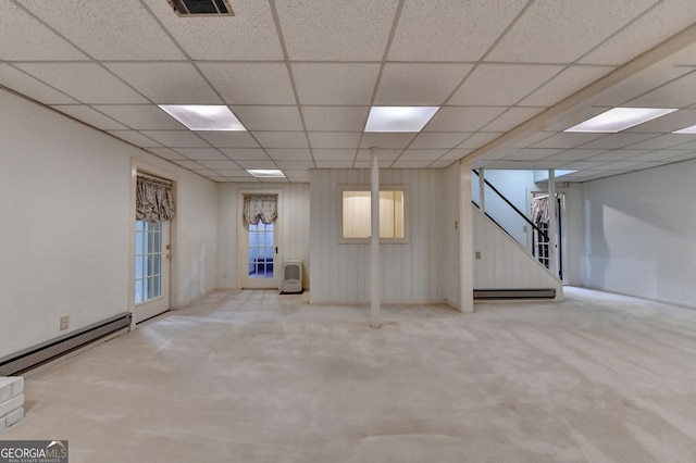 5507 Martina Way, Dunwoody, GA 30338 - finished basement with a baseboard radiator, stairway, a drop ceiling, and carpet