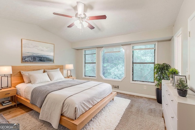2218 Lowtrail Ct, Lithonia, GA 30058 - bedroom with vaulted ceiling, baseboards, and ceiling fan