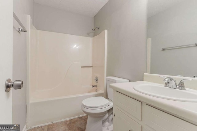 2218 Lowtrail Ct, Lithonia, GA 30058 - bathroom featuring vanity, toilet, shower / tub combination, and a textured ceiling