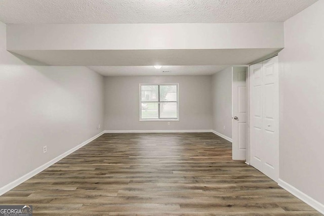 2218 Lowtrail Ct, Lithonia, GA 30058 - spare room with wood finished floors and baseboards