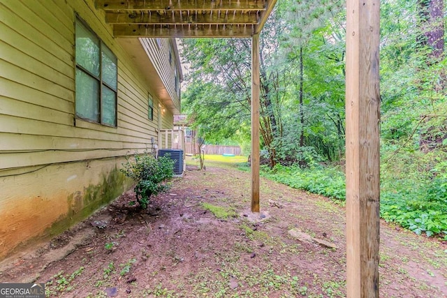 2218 Lowtrail Ct, Lithonia, GA 30058 - view of yard featuring central AC