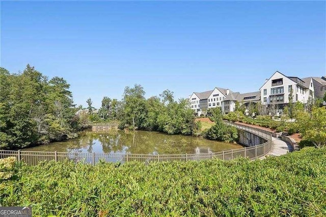 6635 Beacon Dr, Atlanta, GA 30328 - water view featuring a fenced backyard