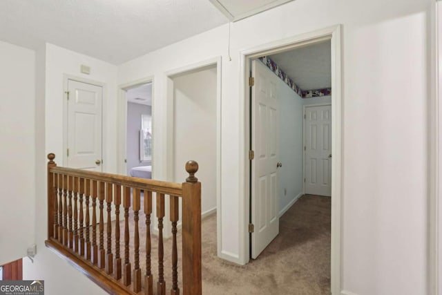 1369 Willowbrook Dr SW, Marietta, GA 30064 - hall featuring an upstairs landing, light carpet, and attic access