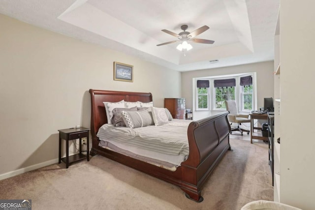 1369 Willowbrook Dr SW, Marietta, GA 30064 - carpeted bedroom featuring a tray ceiling, an office area, and ceiling fan