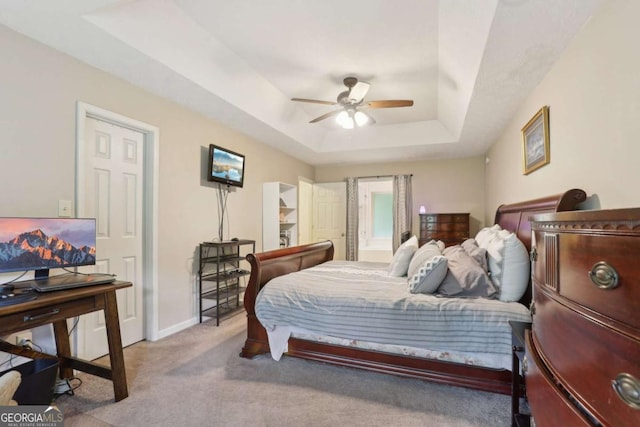 1369 Willowbrook Dr SW, Marietta, GA 30064 - carpeted bedroom featuring a raised ceiling, a ceiling fan, and ensuite bathroom