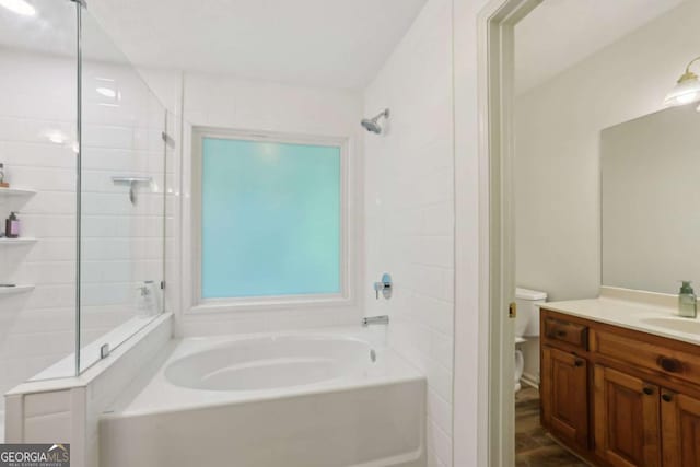 1369 Willowbrook Dr SW, Marietta, GA 30064 - bathroom with a garden tub, vanity, and tiled shower