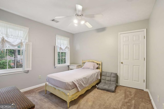 1369 Willowbrook Dr SW, Marietta, GA 30064 - carpeted bedroom with baseboards and a ceiling fan
