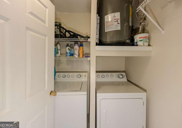 2700 Pine Tree Rd NE Unit 1013, Atlanta, GA 30324 - laundry area with washing machine and clothes dryer and water heater