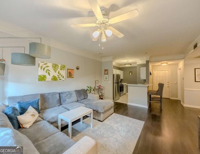 2700 Pine Tree Rd NE Unit 1013, Atlanta, GA 30324 - living room with dark wood finished floors, ceiling fan, and crown molding