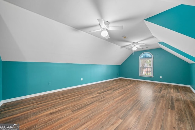 1440 Boundary Blvd, Suwanee, GA 30024 - bonus room with ceiling fan, baseboards, vaulted ceiling, and wood finished floors