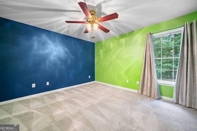 1440 Boundary Blvd, Suwanee, GA 30024 - carpeted empty room with baseboards and a ceiling fan