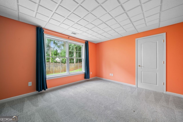1440 Boundary Blvd, Suwanee, GA 30024 - carpeted spare room featuring baseboards and a paneled ceiling