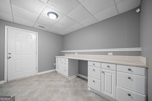 1440 Boundary Blvd, Suwanee, GA 30024 - unfurnished office featuring a drop ceiling, baseboards, and light tile patterned floors