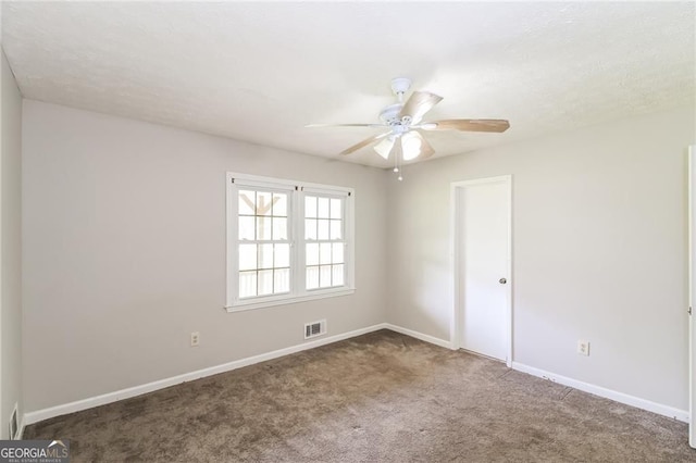 263 Austin Rd, Stockbridge, GA 30281 - unfurnished room featuring carpet and a ceiling fan