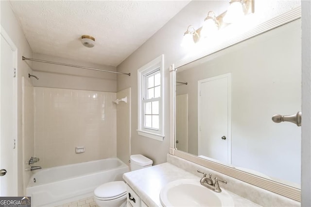 263 Austin Rd, Stockbridge, GA 30281 - bathroom featuring vanity, bathing tub / shower combination, and a textured ceiling