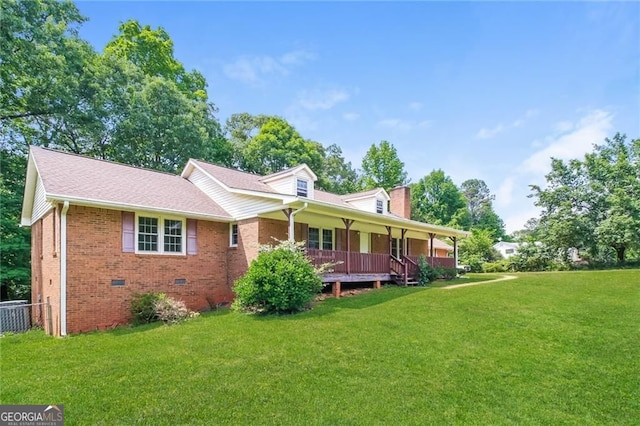 263 Austin Rd, Stockbridge, GA 30281 - view of front facade featuring a front lawn, covered porch, crawl space, and brick siding
