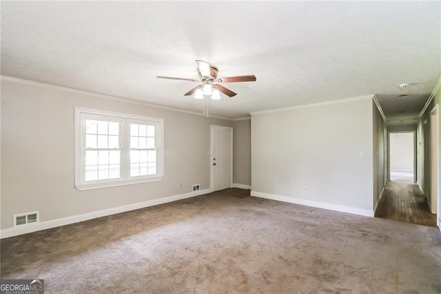 263 Austin Rd, Stockbridge, GA 30281 - carpeted empty room featuring a ceiling fan, ornamental molding, and a textured ceiling