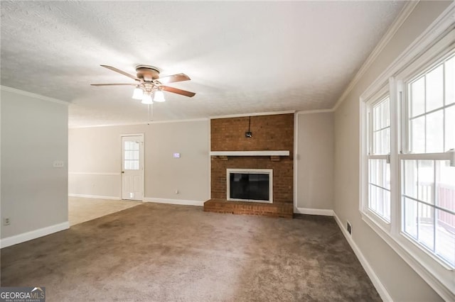 263 Austin Rd, Stockbridge, GA 30281 - unfurnished living room featuring carpet, a ceiling fan, healthy amount of natural light, crown molding, and a textured ceiling